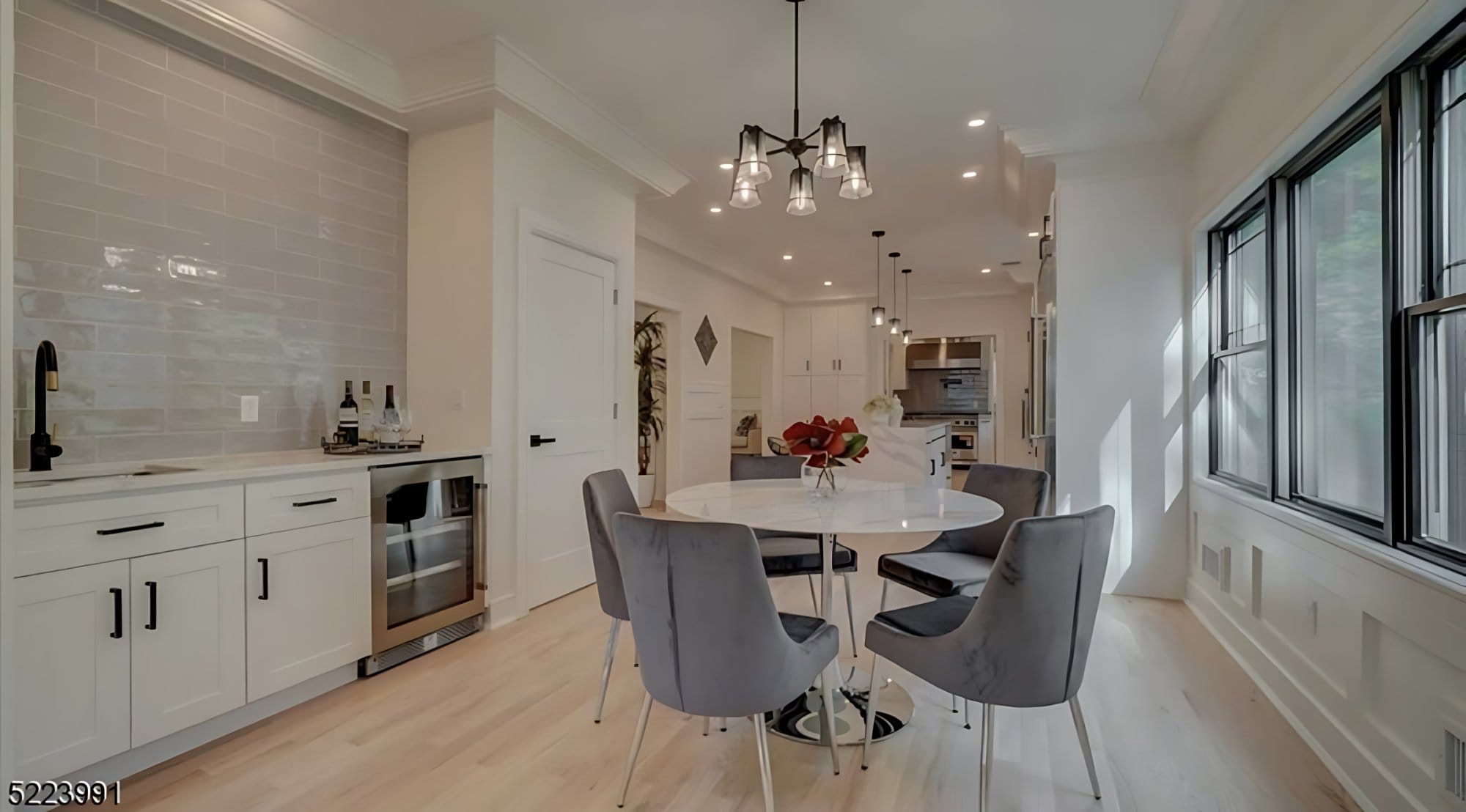 Dining nook with wet bar and wine fridge