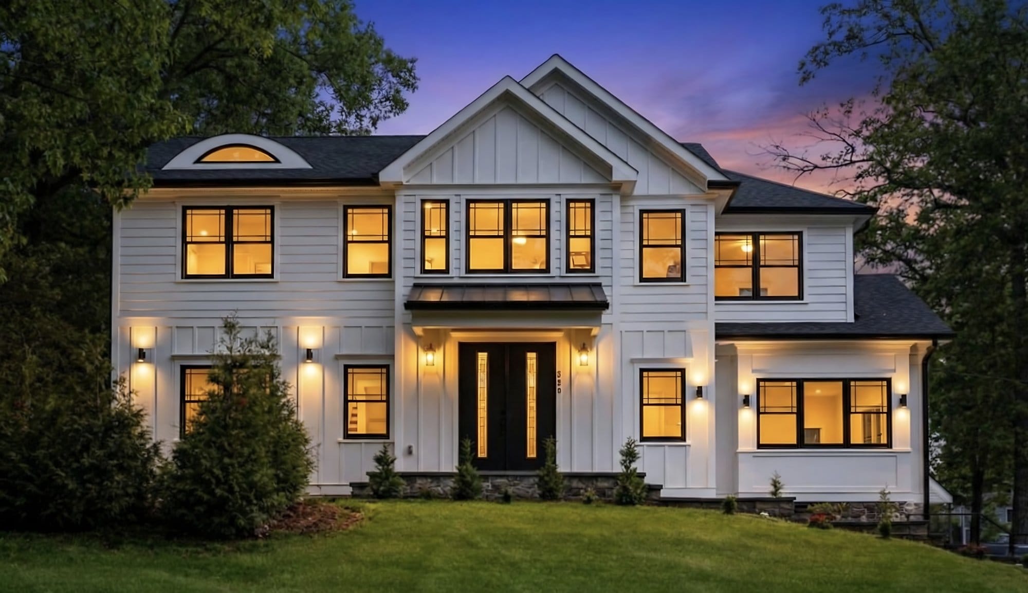 Modern farmhouse at twilight