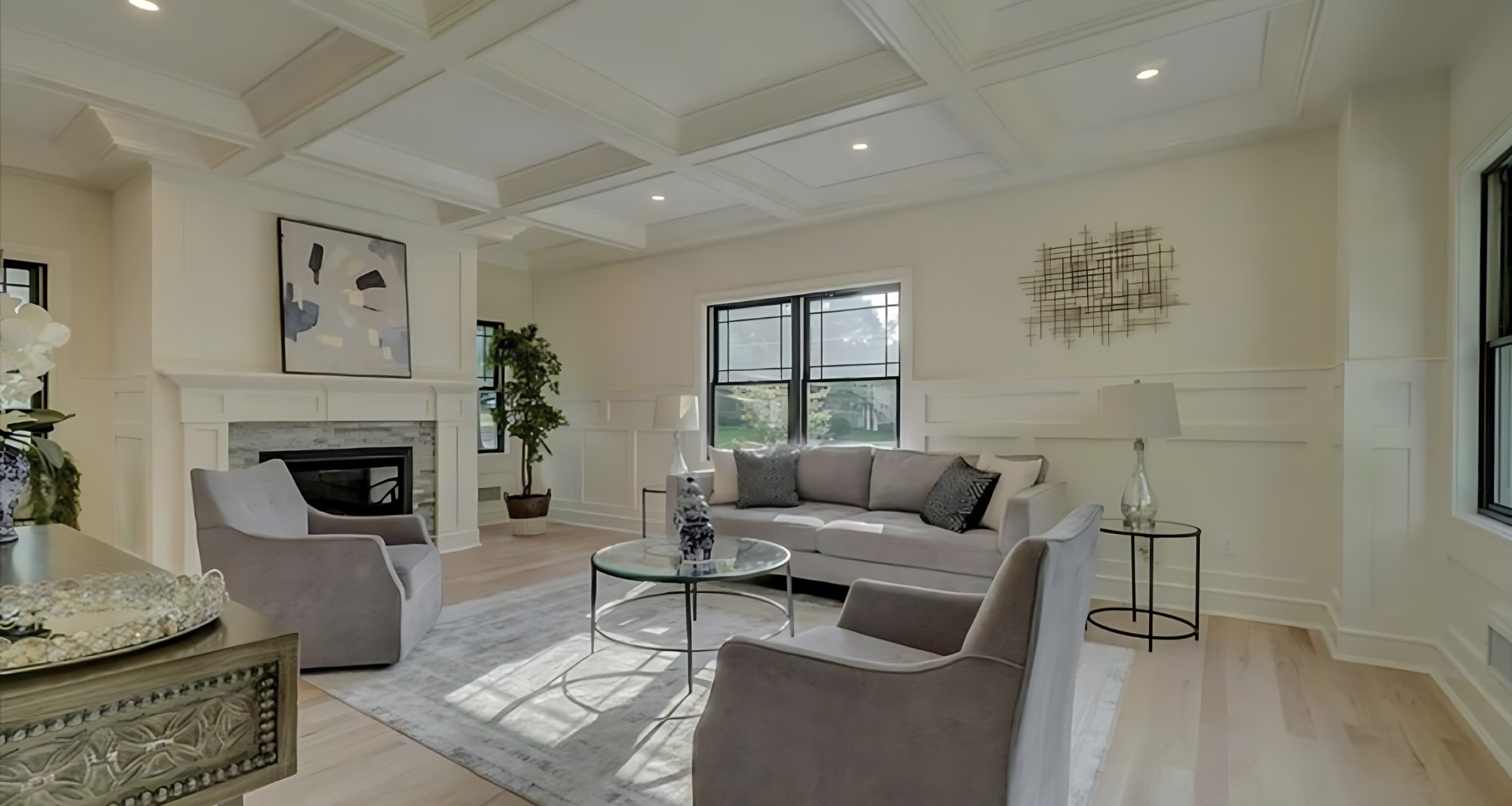 Living room with coffered ceiling and fireplace