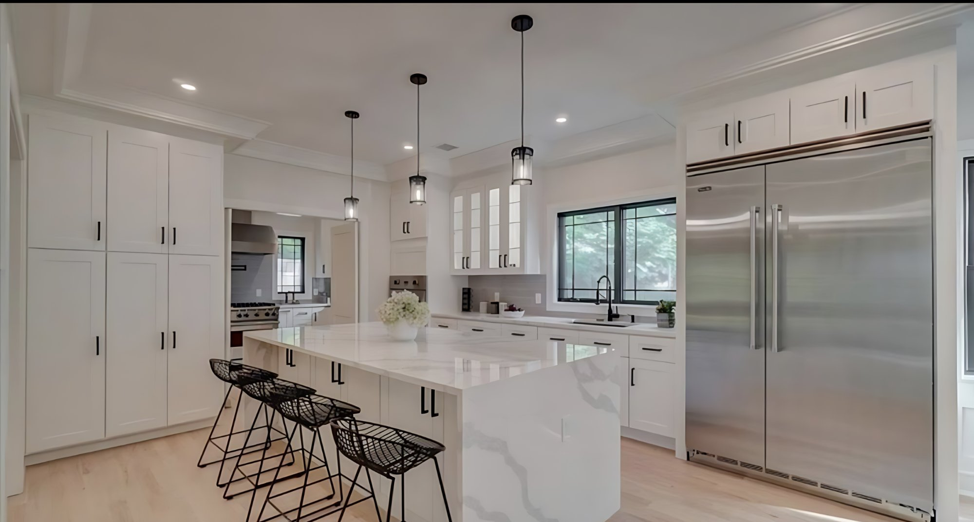 Chef's kitchen with Calacatta island