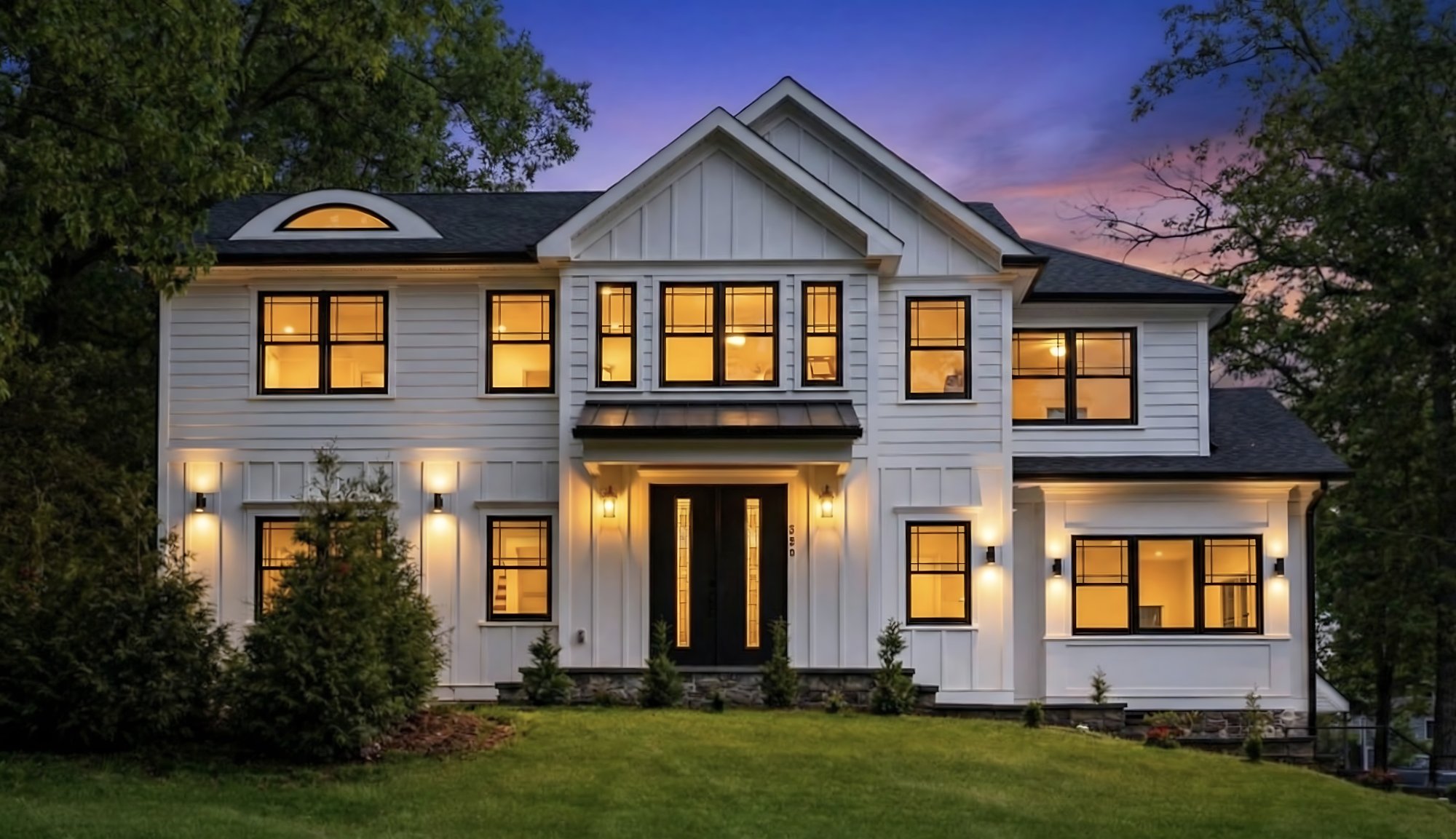 Modern farmhouse at twilight